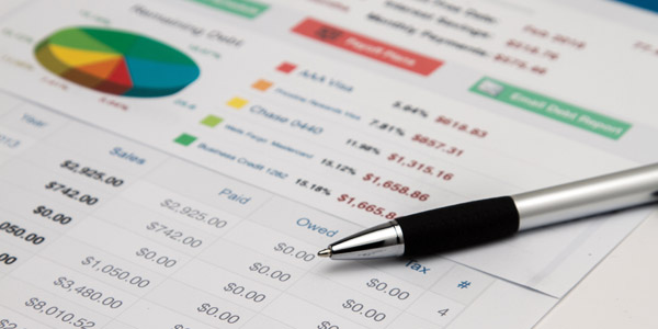 Photo of pen on a financial document